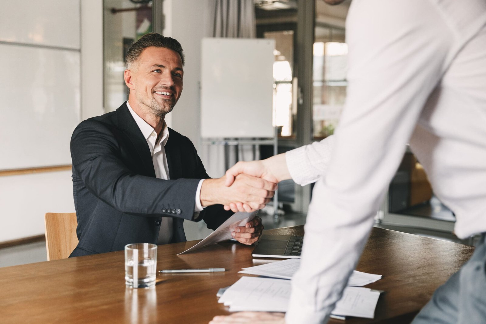 Business, career and placement concept - satisfied director man